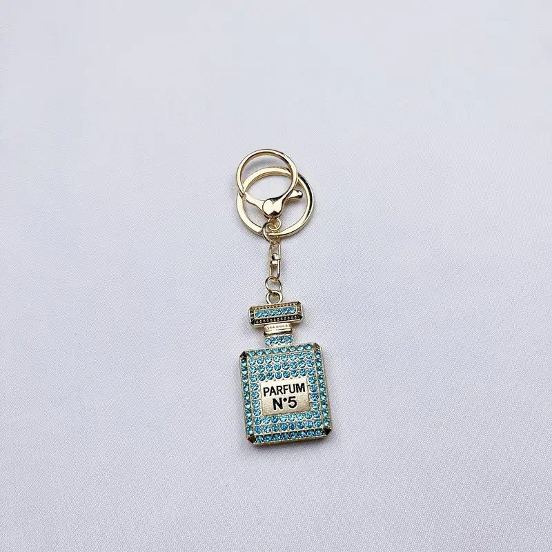 Wholesale Diamond-studded perfume bottle creative metal keychain